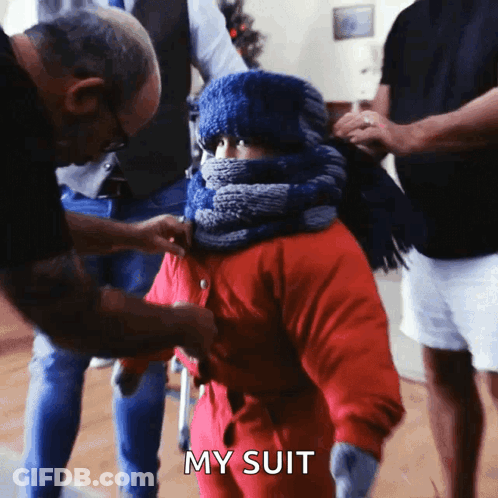 Man On Stage Fingers Numb Teeth Chattering Bundled Up GIF