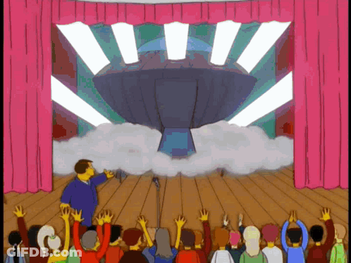 Man On Stage Holding Microphone GIF