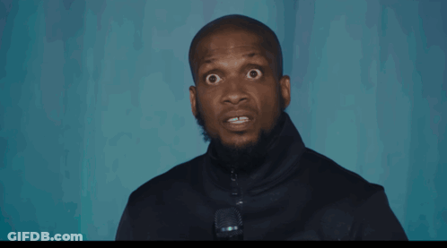 Man On Stage Holding Microphone GIF