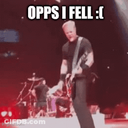 Man On Stage Playing Guitar Saying Opps I Fell GIF