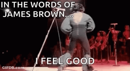 Man On Stage With Microphone And Crowd GIF