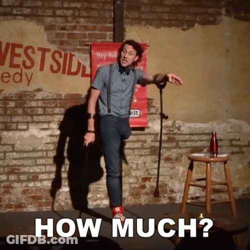 Man On Stage With Westside Comedy Sign GIF
