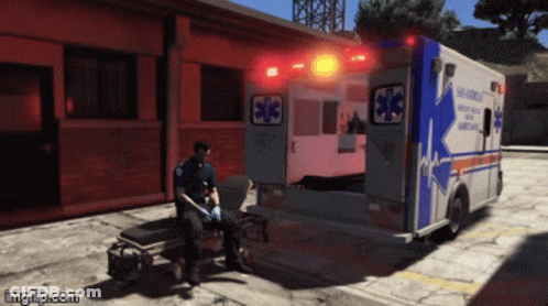 Man On Stretcher In Front Of Ambulance Emergency GIF