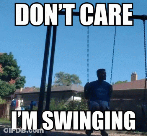 Man On Swing Saying Don't Care I'm Swinging GIF