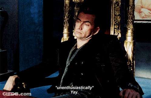 Man On Throne Says Unenthusiastically GIF