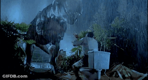 Man On Toilet Attacked By Dinosaur In Rain GIF