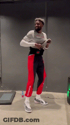 Man On Treadmill Holding Wii Controller GIF