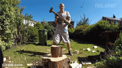 Man On Tree Stump Holding Hammer FailArmy GIF