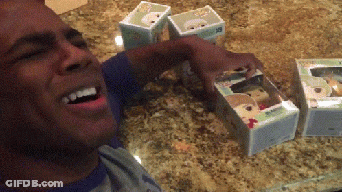 Man Opening Box Of Funko Pop Figures GIF
