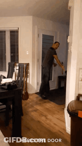 Man Opening Door Saying Heres The Door GIF