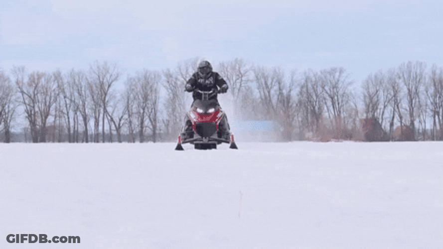 Man Operating A Snowmobile Front View GIF