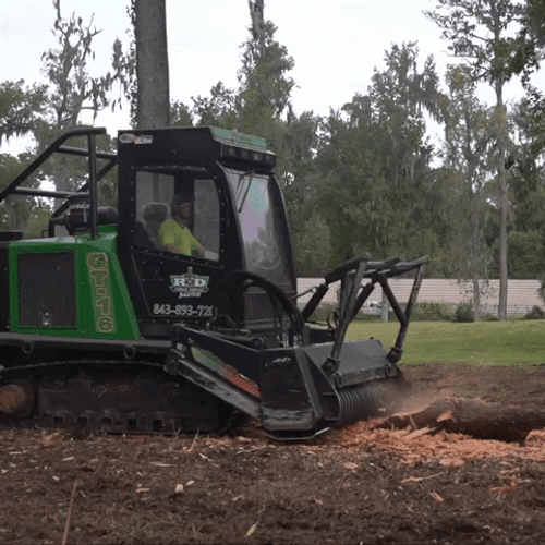Man Operating Machine To Produce Mulch GIF