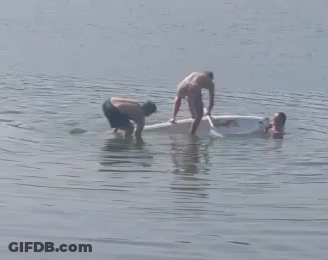 Man Paddling Boat While Another Watches GIF
