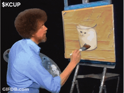 Man Painting Cat In Milk Glass GIF