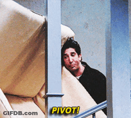 Man Peeking Behind Couch Pivot GIF