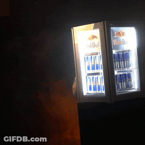 Man Peeking Behind Fridge Full Of Red Bull GIF