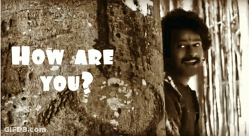 Man Peeking Behind Wall How Are You GIF