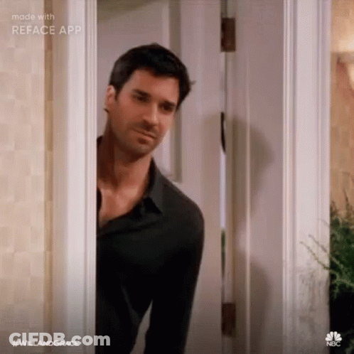 Man Peeking From Behind Door GIF