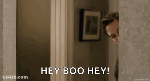 Man Peeking From Behind Wall Saying Hey Boo Hey GIF