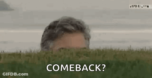 Man Peeking From Field Saying Comeback GIF