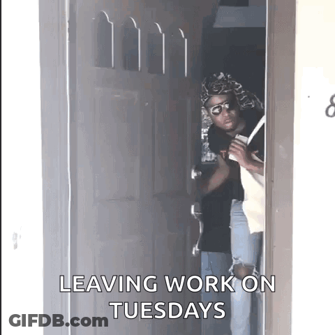Man Peeking Out Of Door Leaving Work GIF