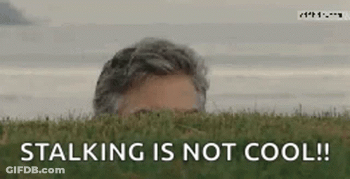 Man Peeking Out Of Grass Stalking Is Not Cool GIF