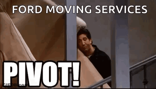 Man Peeking Out Window Ford Moving Services Pivot GIF