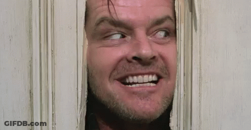 Man Peeking Through Door With Mouth Open GIF