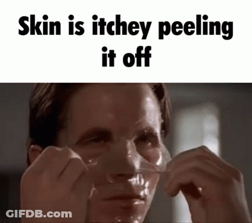 Man Peeling Tape Off Face GIF