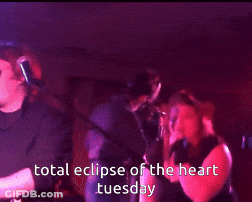 Man Photographs Woman Singing Total Eclipse Of The Heart Tuesday GIF