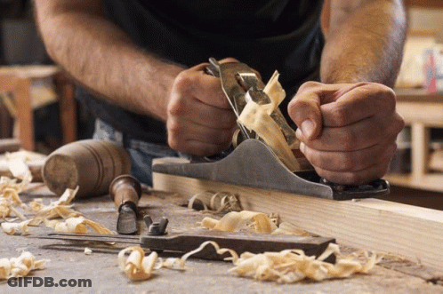 Man Planing Wood With Plane GIF