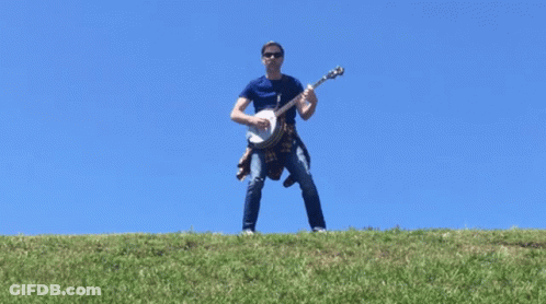 Man Playing Banjo On A Hill GIF