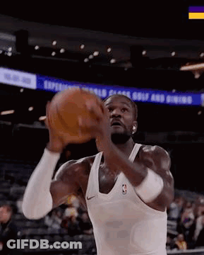 Man Playing Basketball In Stadium GIF
