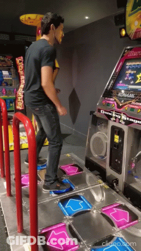 Man Playing Dancing Stage Game GIF
