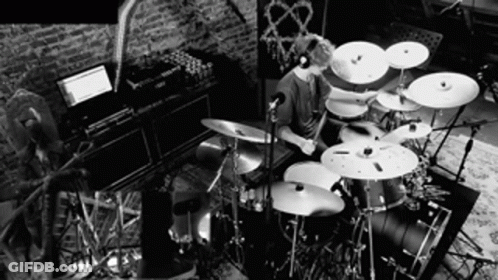 Man Playing Drum Set Black And White GIF