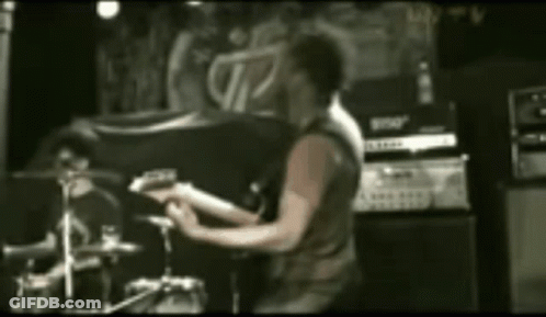 Man Playing Drum Set GIF