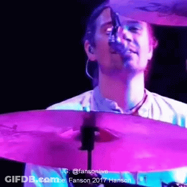 Man Playing Drum Set With Purple Cymbal GIF
