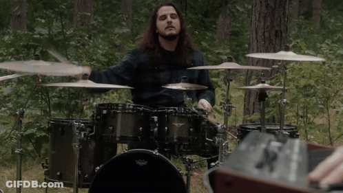 Man Playing Drum Set With Remo Head GIF