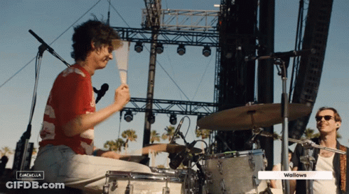 Man Playing Drum Set With Wallows GIF