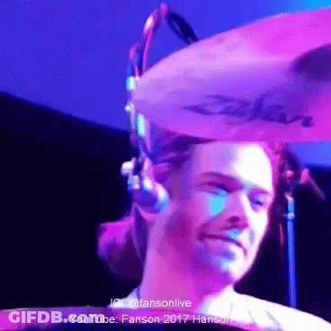 Man Playing Drum Set With Zildjian Cymbal On Head GIF