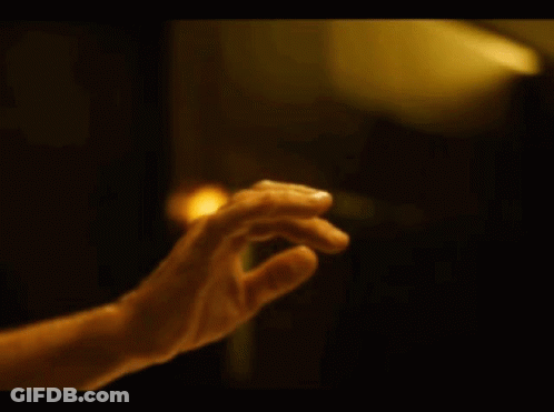 Man Playing Drums In Dark Room With Audience GIF