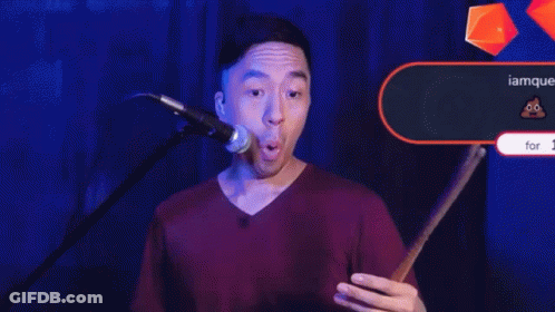 Man Playing Drums In Front Of Crowd GIF