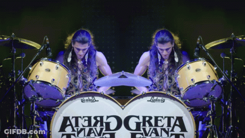 Man Playing Drums In Front Of Greta Drum Set GIF
