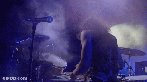 Man Playing Drums In Front Of Microphone GIF