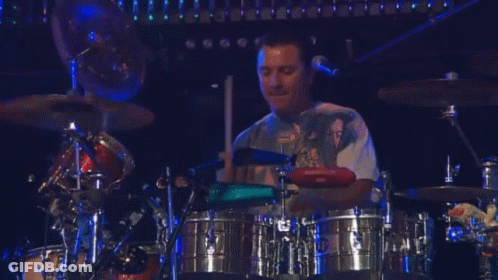 Man Playing Drums In Snoop Dogg Shirt GIF