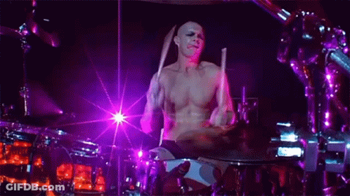 Man Playing Drums On Stage GIF