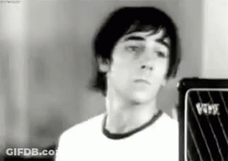 Man Playing Drums While Woman Looks On GIF