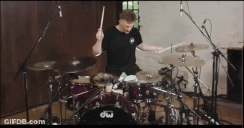 Man Playing Drums With DW Drum Set GIF