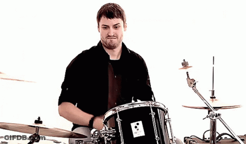 Man Playing Drums With Sabian Drum Set GIF