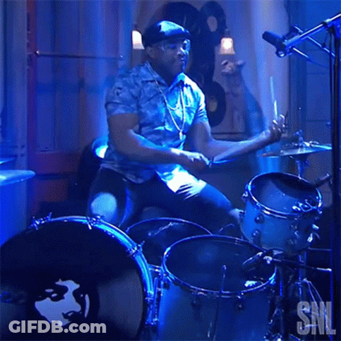 Man Playing Drums With SNL Logo GIF